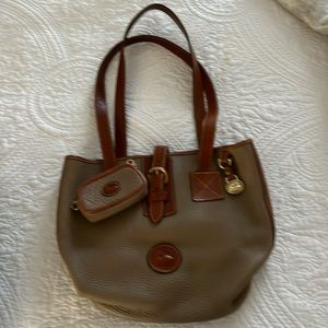 Gently used Dooney & Bourke bucket bag and change purse.